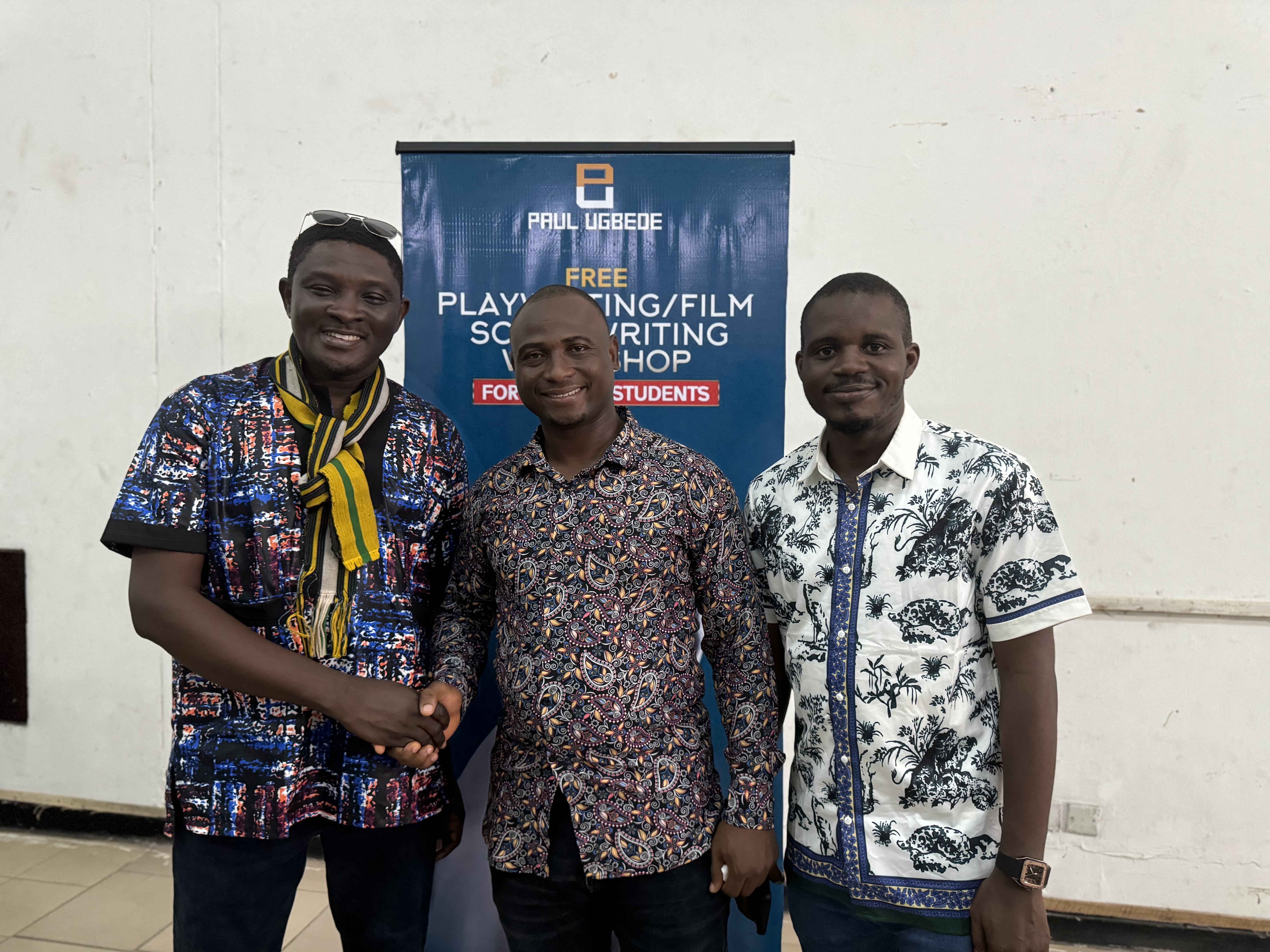 Participants posing in front of the Paul Ugbede workshop banner